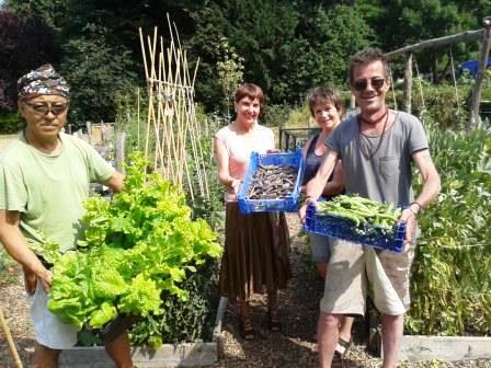 Allotment volunteers smiling